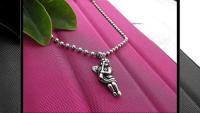 Flute Pendant - Stainless Steel Angel/Cupid Playing Flute