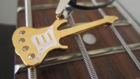 Gold Guitar Pendant  with White Scratch Plate