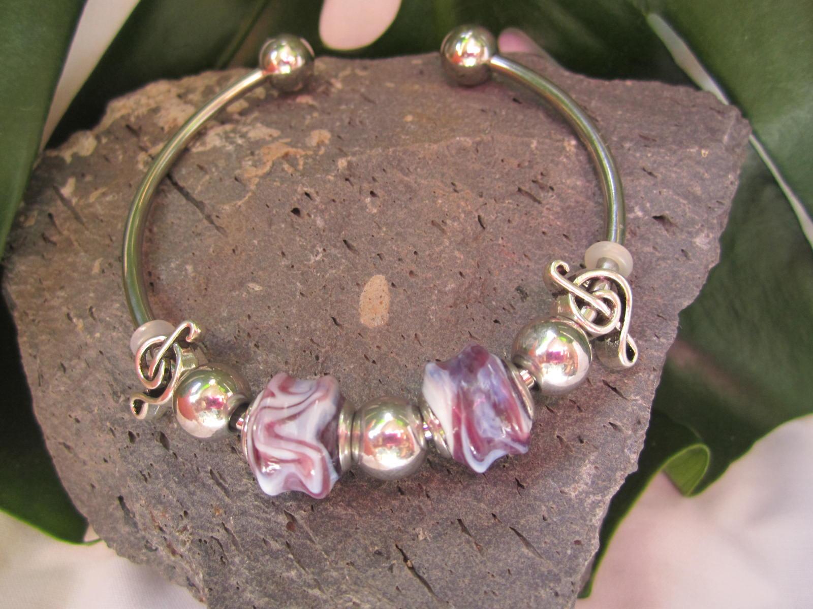 Murano glass bead and music note torc bangle